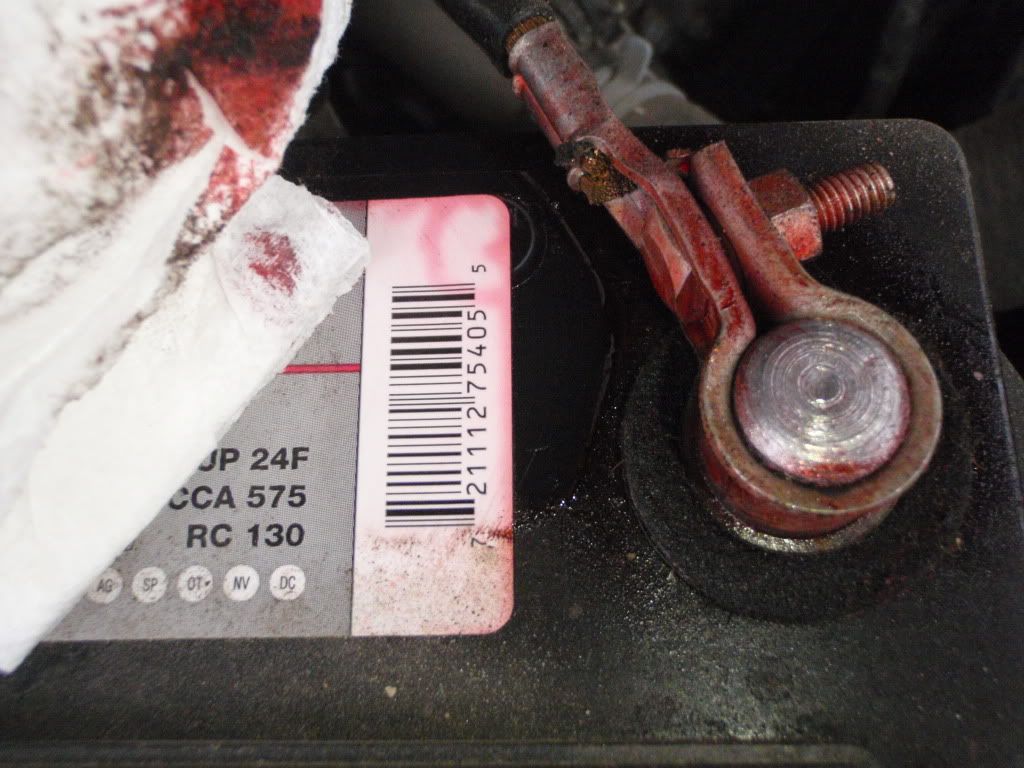 Red sticky substance on the battery? Second Generation Nissan Xterra Forums